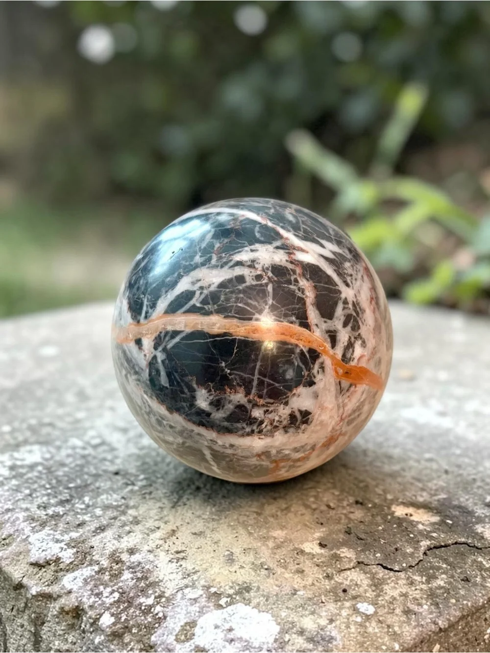 Zebra Jasper Crystal Sphere black and white with orange veining